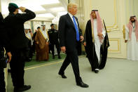 <p>Saudi Arabia’s King Salman bin Abdulaziz Al Saud (L, in brown) and U.S. President Donald Trump (C) arrive for their bilateral meeting at the Royal Court in Riyadh, Saudi Arabia on May 20, 2017. (Photo: Jonathan Ernst/Reuters) </p>