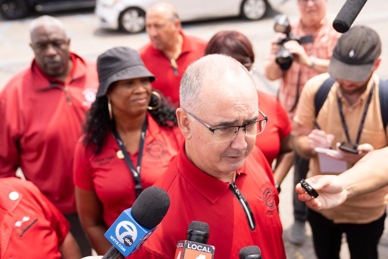 UAW President Shawn Fain speaks with the media during the shift change at GM's Factory Zero in Detroit on July 12, the day before the launch of contract talks with the Detroit Three.
