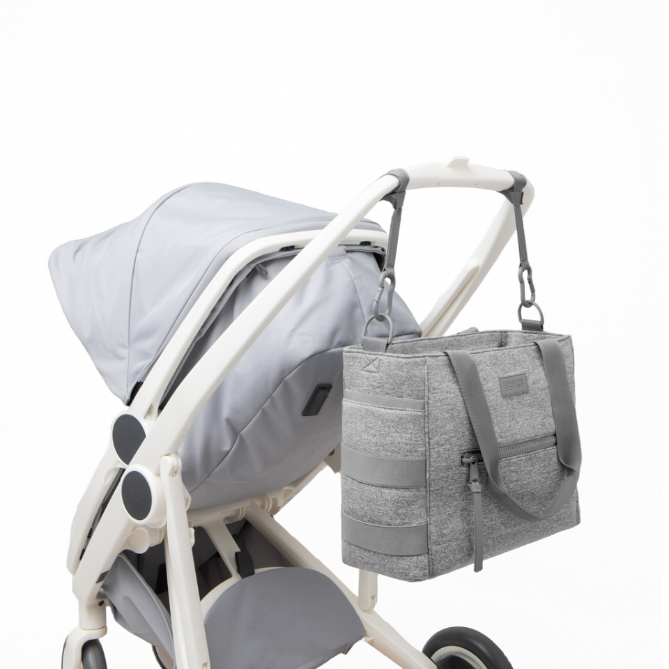 <p><a href="https://go.redirectingat.com?id=74968X1596630&url=https%3A%2F%2Fwww.dagnedover.com%2Fcollections%2Fwade-diaper-tote%23HeatherGrey&sref=https%3A%2F%2Fwww.elledecor.com%2Fshopping%2Fhome-accessories%2Fg60768019%2Fbest-travel-tote-bags%2F" rel="nofollow noopener" target="_blank" data-ylk="slk:Shop Now;elm:context_link;itc:0;sec:content-canvas" class="link ">Shop Now</a></p><p>Wade Diaper Tote</p><p>dagnedover.com</p><p>$215.00</p><span class="copyright">Dagne Dover</span>