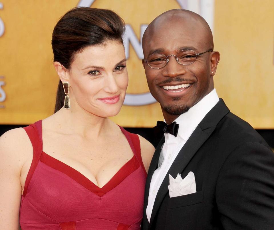 Idina Menzel and Taye Diggs arrive at the 19th Annual Screen Actors Guild Awards at The Shrine Auditorium on January 27, 2013 in Los Angeles, California