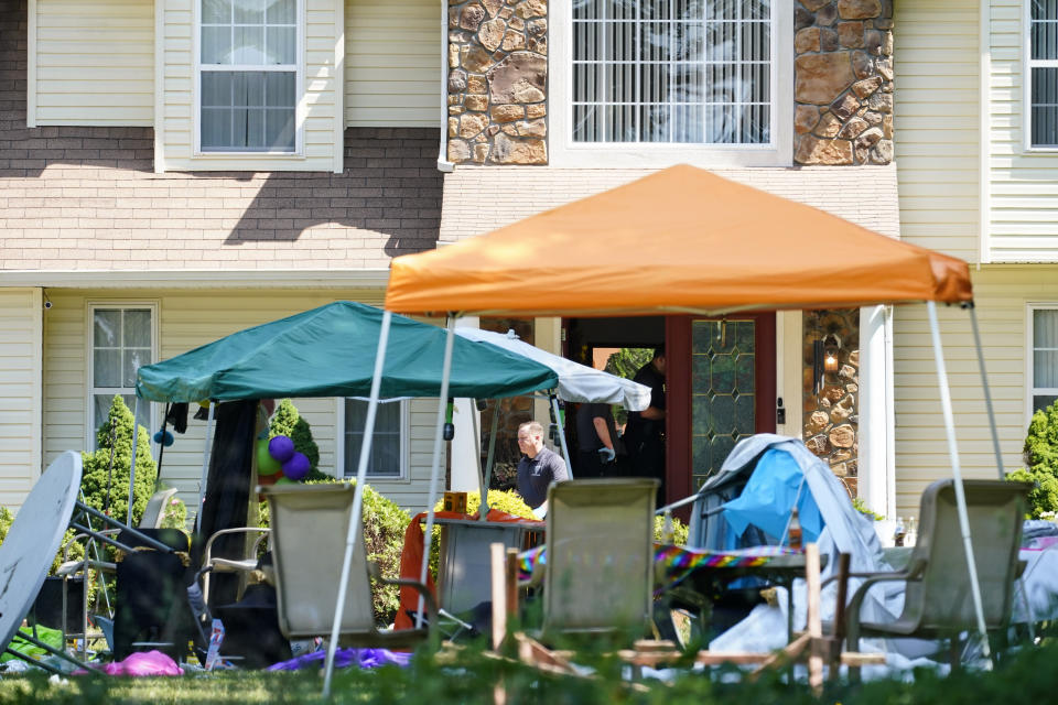 Officers at the scene of the Fairfield shooting where two people were killed.