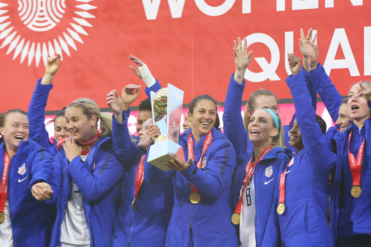 What did we learn from the USWNT's Olympic qualifying tournament? For one, Carli Lloyd (center) is the go-to striker. (Photo by Omar Vega/Getty Images)