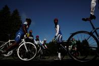 The Wider Image: Haiti's cyclists brave protests and poor roads in race for gold