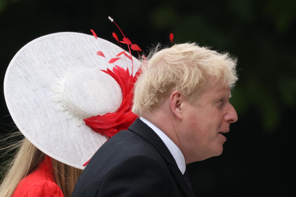 Britain's Prime Minister Boris Johnson and his wife Carrie Symonds arrive to attend the National Service of Thanksgiving for The Queen's reign at Saint Paul's Cathedral in London on June 3, 2022 as part of Queen Elizabeth II's platinum jubilee celebrations. - Queen Elizabeth II kicked off the first of four days of celebrations marking her record-breaking 70 years on the throne, to cheering crowds of tens of thousands of people. But the 96-year-old sovereign's appearance at the Platinum Jubilee -- a milestone never previously reached by a British monarch -- took its toll, forcing her to pull out of a planned church service. (Photo by Hollie Adams / AFP) (Photo by HOLLIE ADAMS/AFP via Getty Images)