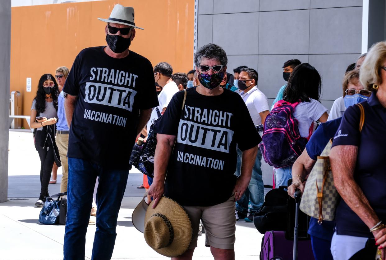 Passengers prepare to board the Celebrity Edge cruise ship in Fort Lauderdale, Florida, on June 26, 2021. (Maria Alejandra Cardona/AFP via Getty Images)