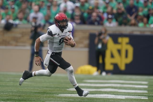 Desmond Ridder shines as No. 7/8 Cincinnati defeats No. 9/7 Notre Dame  24-13 in South Bend