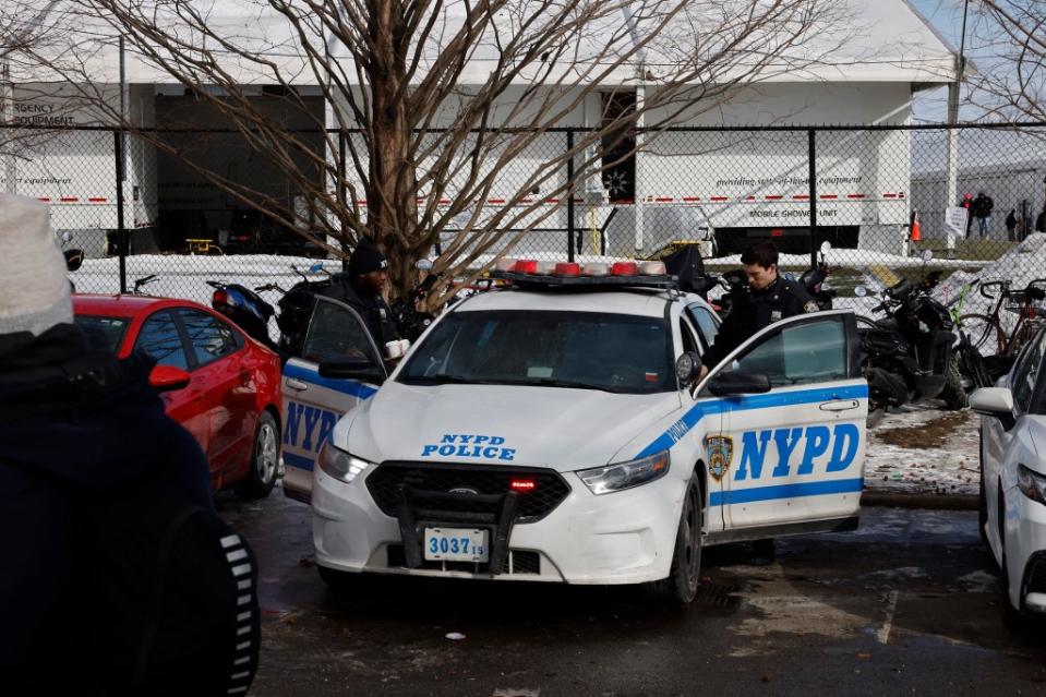 A shelter resident allegedly punched a security guard in the face and a second man assaulted the guard as he spoke to police officers who were responding to the punch, police said. Kevin C. Downs for NY Post