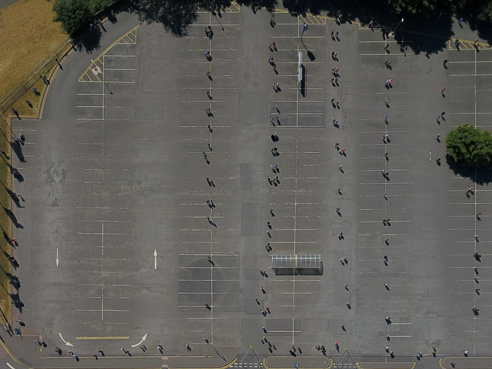 Aerial view of shoppers waiting to get inside the Wednesbury Ikea. (SWNS)