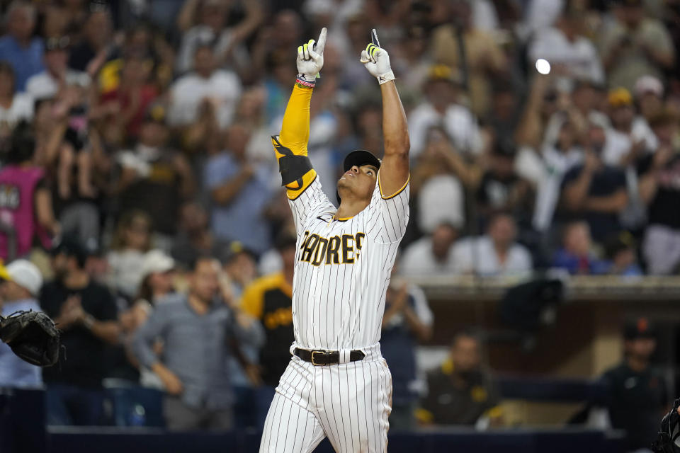 San Diego Padres' Juan Soto gestures after hitting a home run against the San Francisco Giants during the fourth inning of a baseball game Tuesday, Aug. 9, 2022, in San Diego. (AP Photo/Gregory Bull)