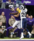 <p>Los Angeles Rams free safety Lamarcus Joyner (20) breaks up a pass intended for Minnesota Vikings wide receiver Adam Thielen during the first half of an NFL football game, Sunday, Nov. 19, 2017, in Minneapolis. (AP Photo/Bruce Kluckhohn) </p>