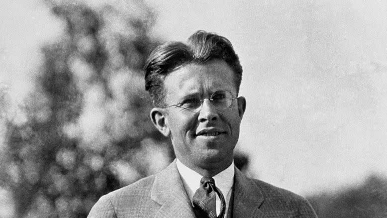 ernest o lawrence holding particle accelerator