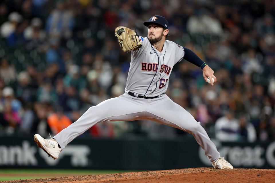 Bennett Sousa #62 of the Houston Astros pitches against the Seattle Mariners at T-Mobile Park on September 26, 2023 in Seattle, Washington.