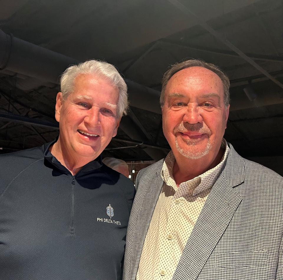 Former Tennessee Supreme Court Justice Gary Wade, left, and Carroll McMahan, Sevier County historian and Sevierville Chamber of Commerce special projects facilitator, at McMahan’s retirement party March 14 at The Pines Downtown. The two men grew up together in Sevierville.