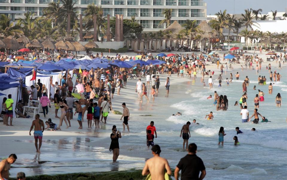 Bathers enjoy Forum Beach as tourism returns to the city during Holy Week on April 3, 2021 in Cancun, Mexico - Medios y Media/Getty Images