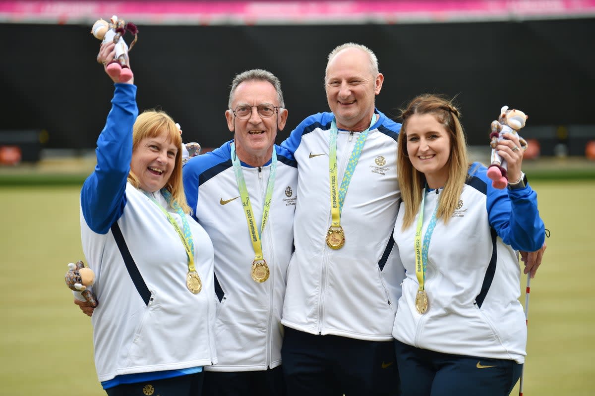 Gold medalists Melanie Inness, George Miller, Robert Barr and Sarah Jane Ewing of Team Scotland celebrate (Getty Images)