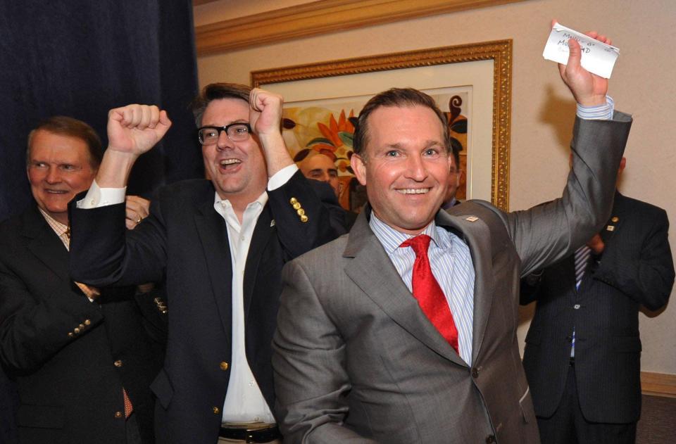 Lenny Curry, Republican candidate for Jacksonville Mayor, followed the vote at the Hyatt Regency Jacksonville in Jacksonville on election night, March 24, 2015. Curry appears just after 9 p.m. with his spokesman Brian Hughes celebrating the night.