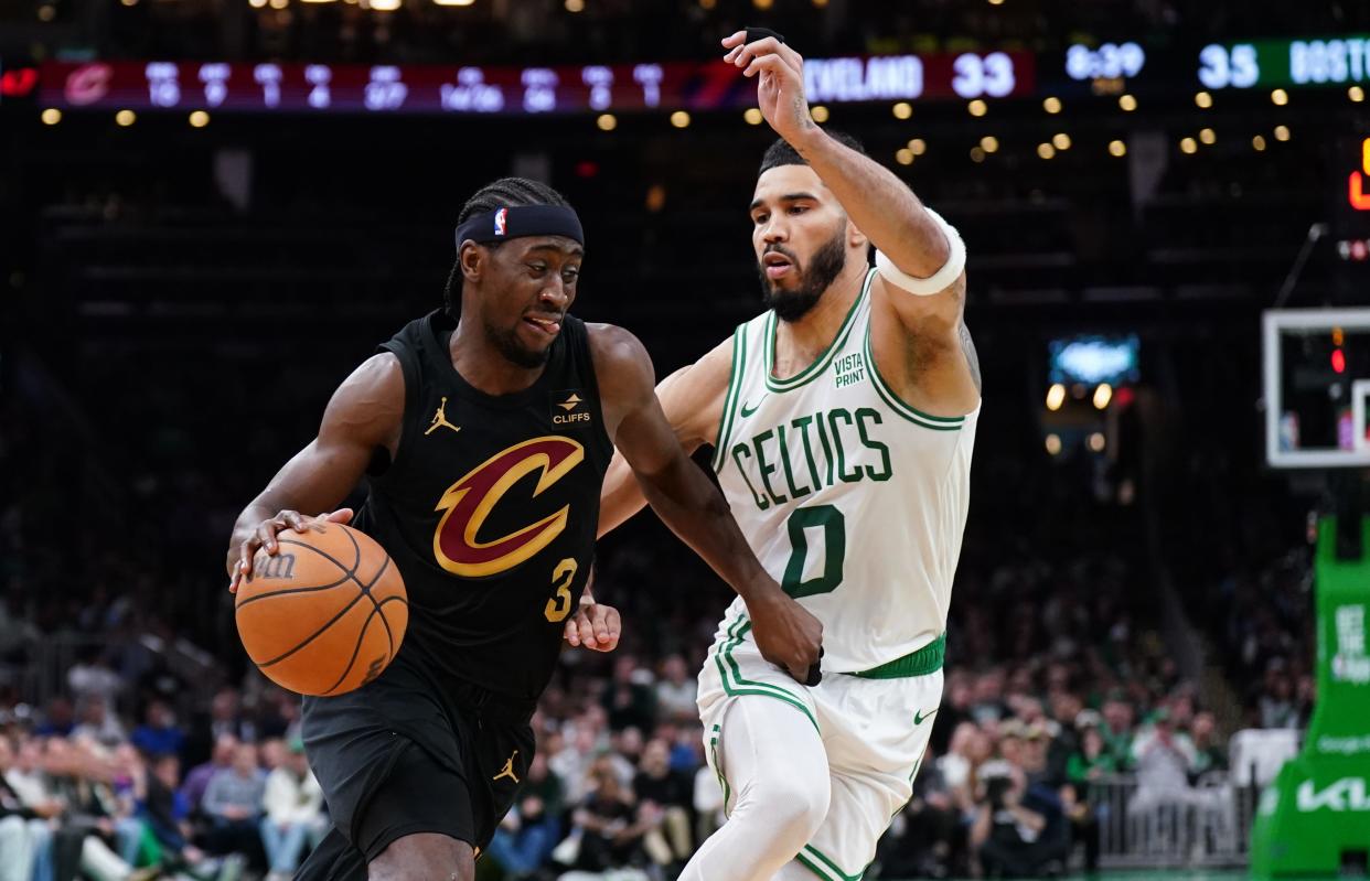 Cleveland Cavaliers guard Caris LeVert (3) drives the ball against Boston Celtics forward Jayson Tatum (0) in the second quarter during game two of the second round for the 2024 NBA playoffs at TD Garden.