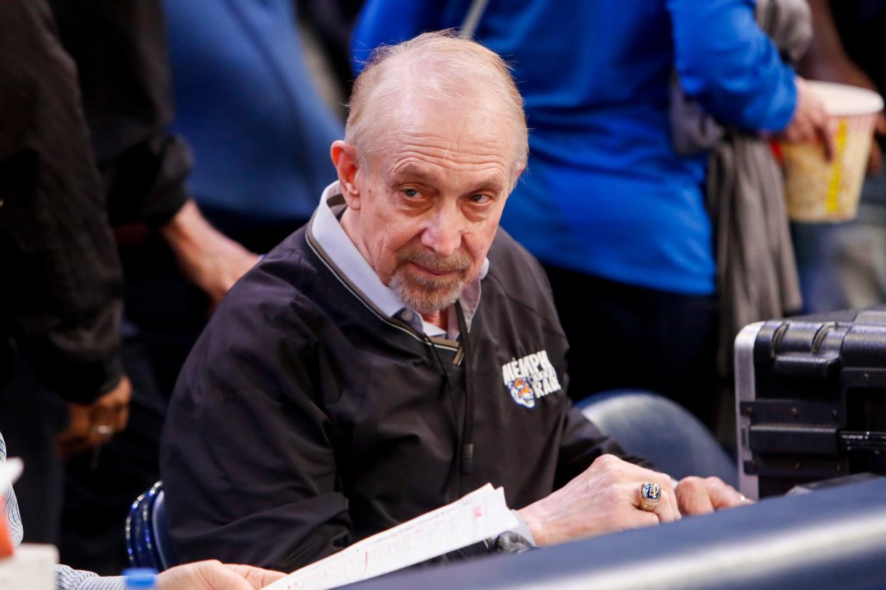 Memphis radio broadcaster Matt Dillon sits near the court after Memphis defeated UAB 106-87 at FedExForum in Memphis, Tenn., on Sunday, March 3, 2024.