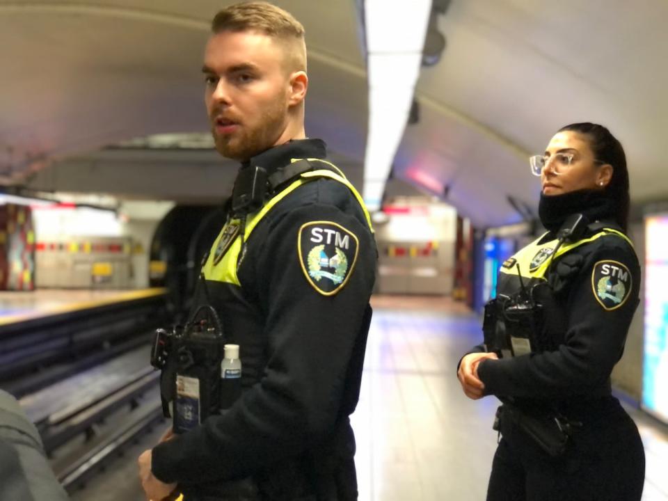 STM special constables William Barrow and Christine Cassis patrol the platform of Guy-Concordia station on the night of March 22, 2023. It's been just over a year since STM special constables began carrying naloxone to respond to a rising number of overdoses in Montreal's metro system.