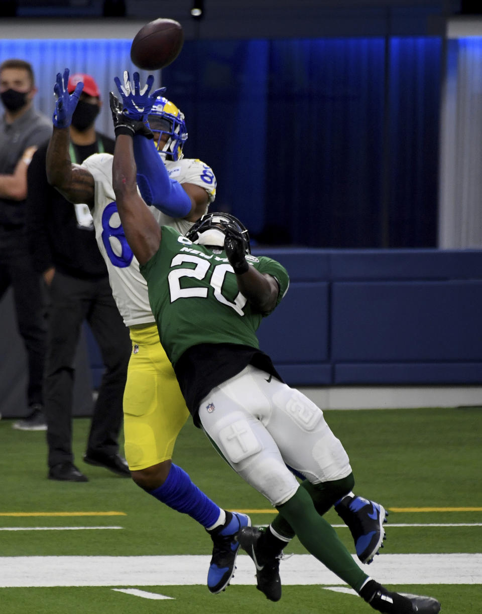 New York Jets free safety Marcus Maye (20) knocks a pass away against tight end Los Angeles Rams' Gerald Everett (81) on fourth down in the second half of an NFL football game in Inglewood, Calif., Sunday, Dec. 20, 2020. (Keith Birmingham/The Orange County Register via AP)