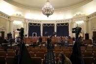 Television news crews set up for live reports ahead of Trump impeachment inquiry testimony before a House Intelligence Committee hearing on Capitol Hill in Washington