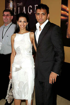 M. Night Shyamalan and wife Bhavna at the NY premiere of Touchstone's The Village