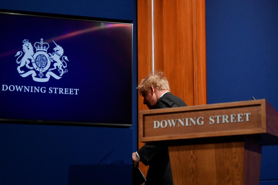 <p>Mr Johnson in the briefing room</p> (PA)