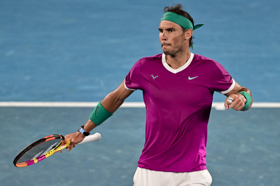 MELBOURNE, AUSTRALIA - JANUARY 28: Rafa Nadal of Spain celebrates during his match against Matteo Berrettini of Italy during day 12 of the 2022 Australian Open at Melbourne Park on January 28, 2022 in Melbourne, Australia. (Photo by TPN/Getty Images)