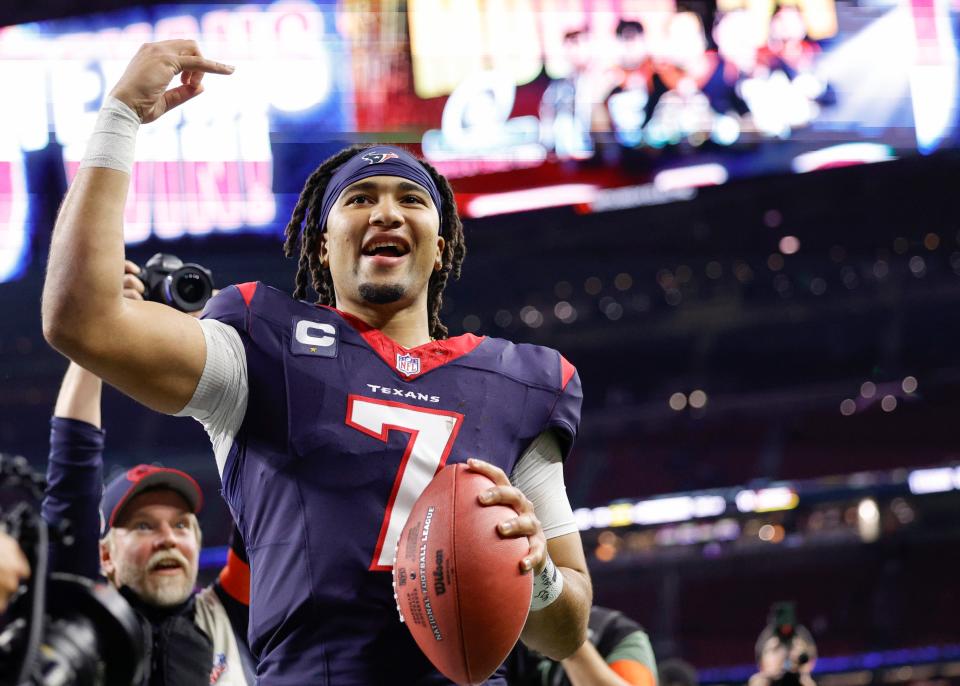 C.J. Stroud #7 of the Houston Texans celebrates after defeating the Cleveland Browns in the AFC wild-card round at NRG Stadium on January 13, 2024 in Houston, Texas