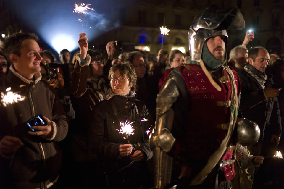 A man dressed like a Middle Age soldier attends ceremonies marking the 600th anniversary of the birth of Joan of Arc, in Orleans, central France, Sunday April 29, 2012. The city of Orleans goes all out with celebrations marking the 600th birthday of Joan of Arc, a national icon and symbol of French resistance through the ages at a time when French identity and France's role in the world are a focus in the presidential campaign. (AP Photo/Thibault Camus)