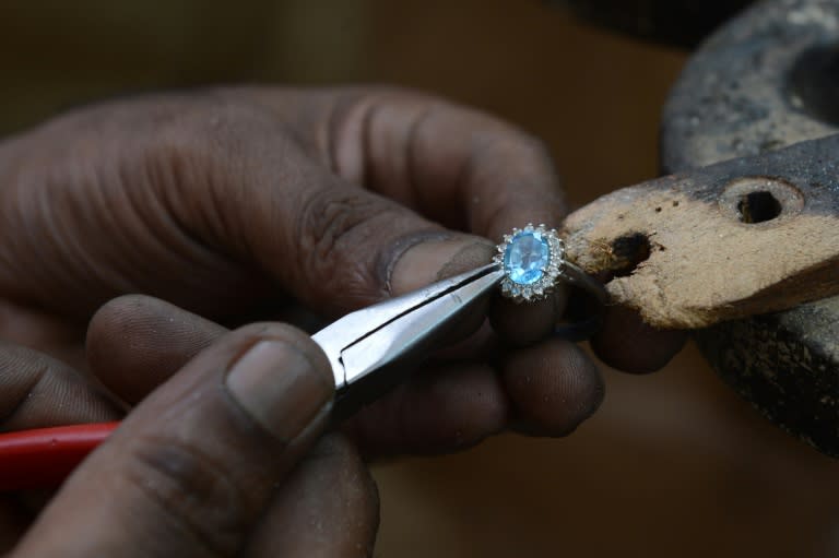 A Sri Lankan artisan produces jewellery at a workshop in Bentota, some 65 km south of Colombo
