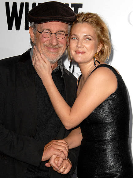 <p><b>STEVEN SPIELBERG</b><br>When Drew Barrymore phones home, we're sure she often dials up godfather Spielberg, who directed the young star in 1982's E.T. when she was 6. The pair are so close, he even attended her 2012 wedding. "Everyone we love and care about was there," the actress told WHO.</p>