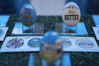 Eggs designed by children of members of the military adorn the East Colonnade of the White House ahead of the White House Easter Egg Roll, Thursday, March 28, 2024, in Washington. (AP Photo/Evan Vucci)