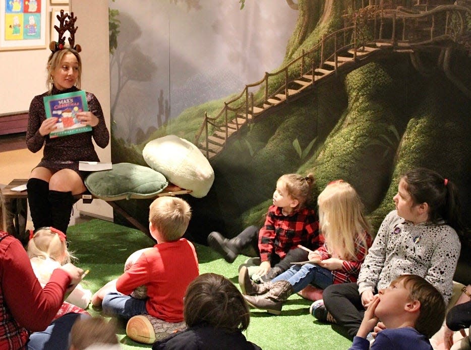 Kellie Mele, WCMFA director of education, reads to children during the “Childhood Favorites: 100 Years of Children’s Book Illustration” community day in November.