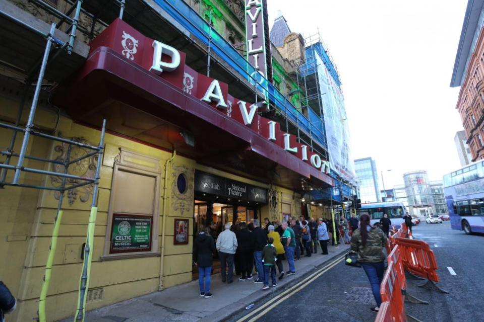 Herald Scotland: Spectators line up at Glasgow Pavilion