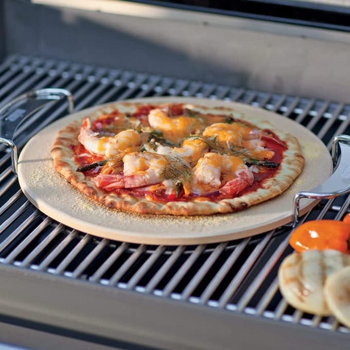 <a href="https://www.amazon.com/Weber-8836-Gourmet-System-Pizza/dp/B006WRLBNU/?tag=readerwp-20" rel="nofollow noopener" target="_blank" data-ylk="slk:Weber Gourmet Pizza Stone;elm:context_link;itc:0;sec:content-canvas" class="link rapid-noclick-resp">Weber Gourmet Pizza Stone</a>