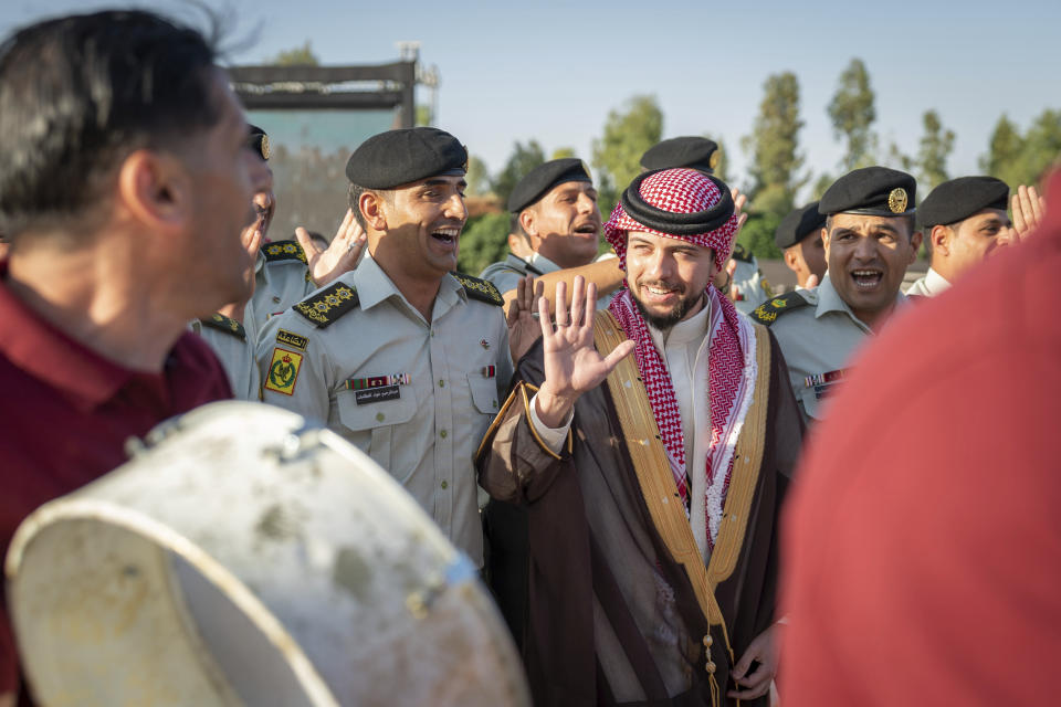 Crown Prince Hussein attends a celebration in Amman, Jordan, on Wednesday, May 31, 2023, a day before his wedding to Saudi architect Rajwa Alseif. (Royal Hashemite Court via AP)