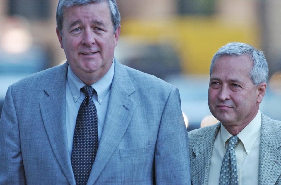 FBI Special Agent W. Dennis Aiken, left, arrives with Antonio R. Freitas at U.S. District Court in Providence for the Operation Plunder Dome trial, in which Freitas was a key witness for the prosecution.