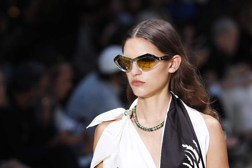 A model wears a creation as part of the Bottega Veneta Spring-Summer 2020 collection, unveiled during the fashion week, in Milan, Italy, Thursday, Sept. 19, 2019. (AP Photo/Antonio Calanni)