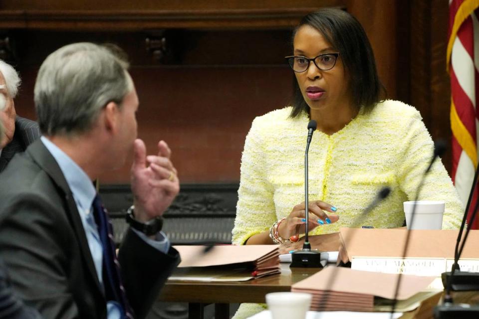 Mississippi House Appropriations A Committee Vice Chair Angela Cockerham, I-Magnolia, right, confers with State Rep. Sam Mims, R-McComb, on Project Atlas. Rogelio V. Solis/AP