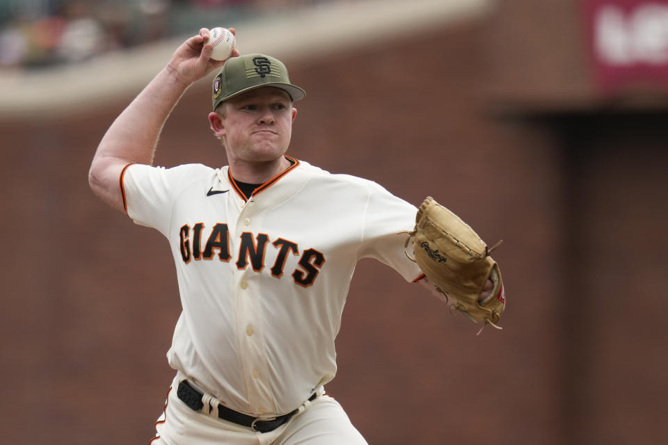 San Francisco Giants' Logan Webb pitches against the Miami Marlins during the first inning of a baseball game in San Francisco, Saturday, May 20, 2023. (AP Photo/Godofredo A. Vásquez)