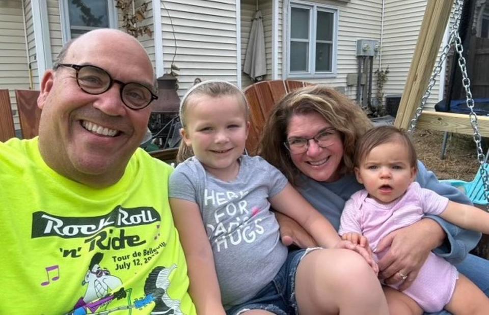 Phil Elmore and his wife, Barb Elmore, founded Tour de Belleville in 2006 as a fun neighborhood activity and a fundraiser for safety equipment. They’re shown today with their grandchildren, Addie, left, and Maddie.