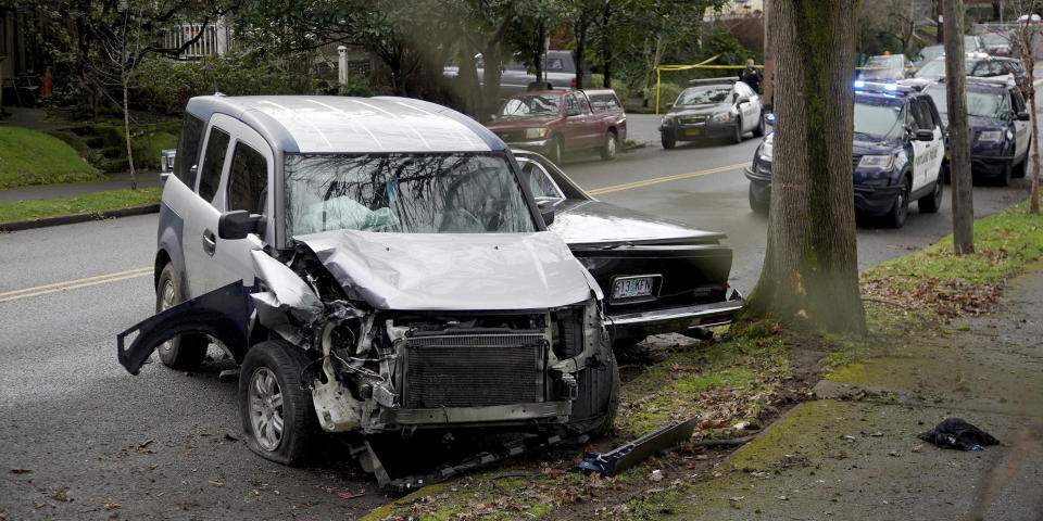 Image: Image: car hits pedestrians (Beth Nakamura / The Oregonian via AP)