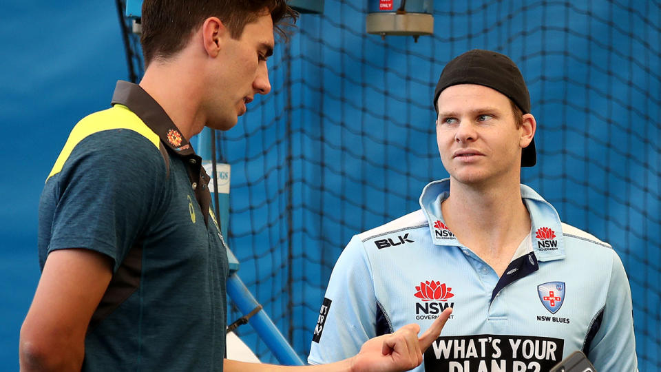 Pat Cummins and Steve Smith. (Photo by Cameron Spencer/Getty Images)