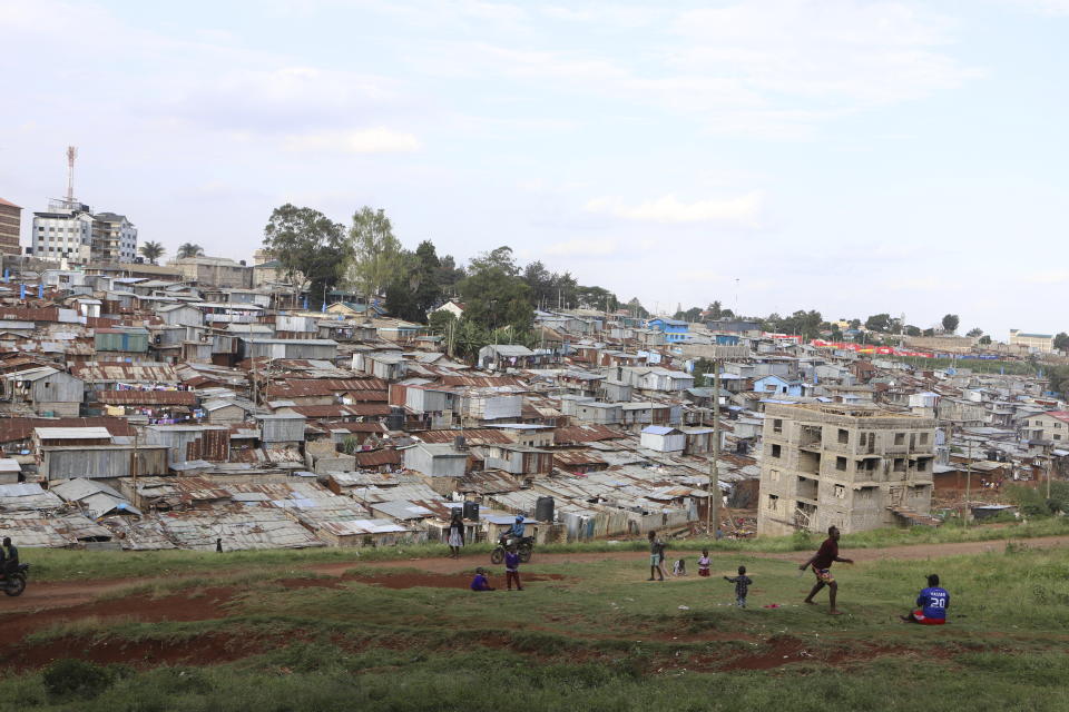 A view of residential structures in the Kibera slum of the capital Nairobi, Kenya, Tuesday, May 28, 2024. Kenya's urban population makes up a third of the country's total population of more than 50 million. Of those living in urban areas, 70% live in informal settlements marked by lack of basic infrastructure, according to UN-Habitat. (AP Photo/Andrew Kasuku)