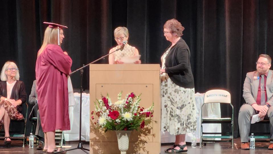 One of the essay winners at the Dover Adult Learning Center graduation on June 20, 2023, Jennica Robidoux receives her certificate.