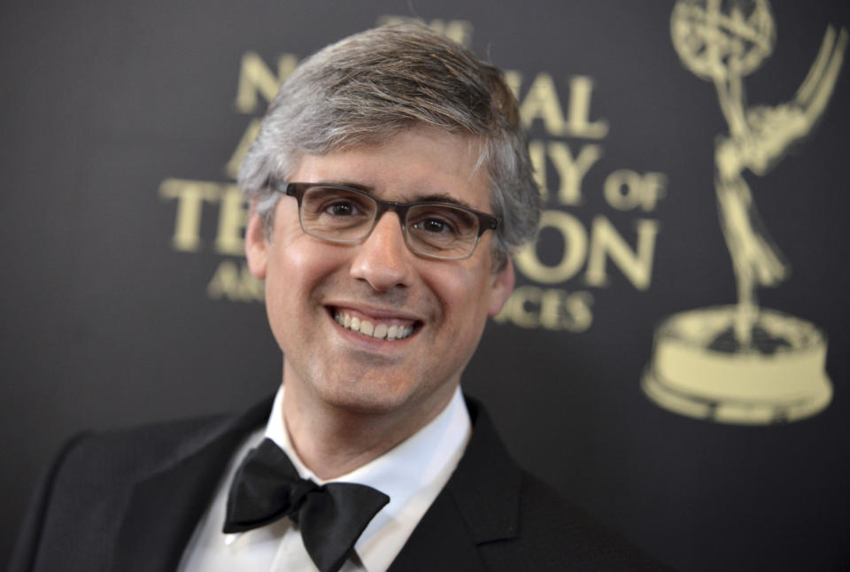 FILE - This June 22, 2014 file photo shows Mo Rocca at the 41st annual Daytime Emmy Awards in Beverly Hills, Calif. Rocca released a book "Mobituaries: Great Lives Worth Reliving, " in November. (Photo by Richard Shotwell/Invision/AP, File)