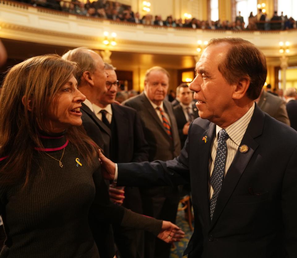 Assembly Speaker Craig Coughlin, here speaking with First Lady Tammy Murphy, has introduced an SDA overhaul bill that would make charter and renaissance schools eligible for the first time to access SDA facilities money, adding more schools to compete for already limited funds.