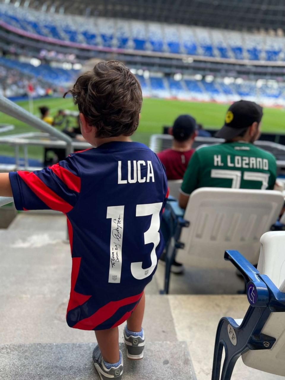 PHOTO: After noticing Luca's cheering, soccer star Alex Morgan couldn't resist surprising him with a special gift - a signed jersey! (Courtesy Ana Jackson)