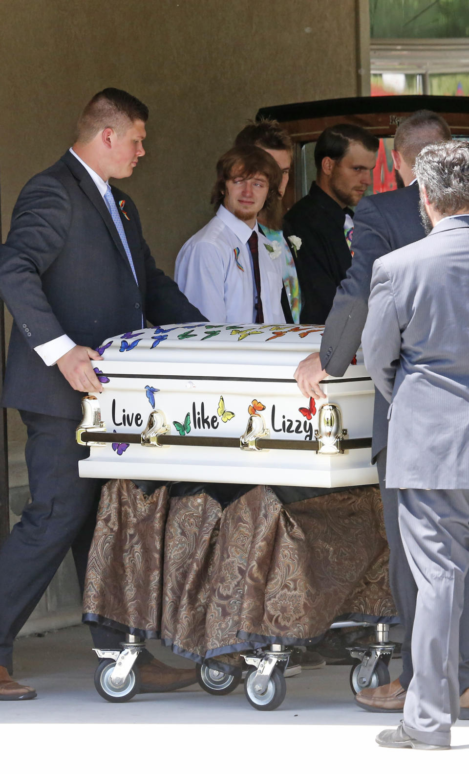 The casket for Elizabeth "Lizzy" Shelley, a 5-year-old girl who police say was taken from her home and killed by her uncle, is carried following services Tuesday, June 4, 2019, in Logan, Utah. Her uncle, Alex Whipple, is charged with killing her after his sister let him spend the night at the family's home, prosecutors said. Elizabeth "Lizzy" Shelley disappeared May 25 and was found dead less than a block from her home after a five-day search. (AP Photo/Rick Bowmer)